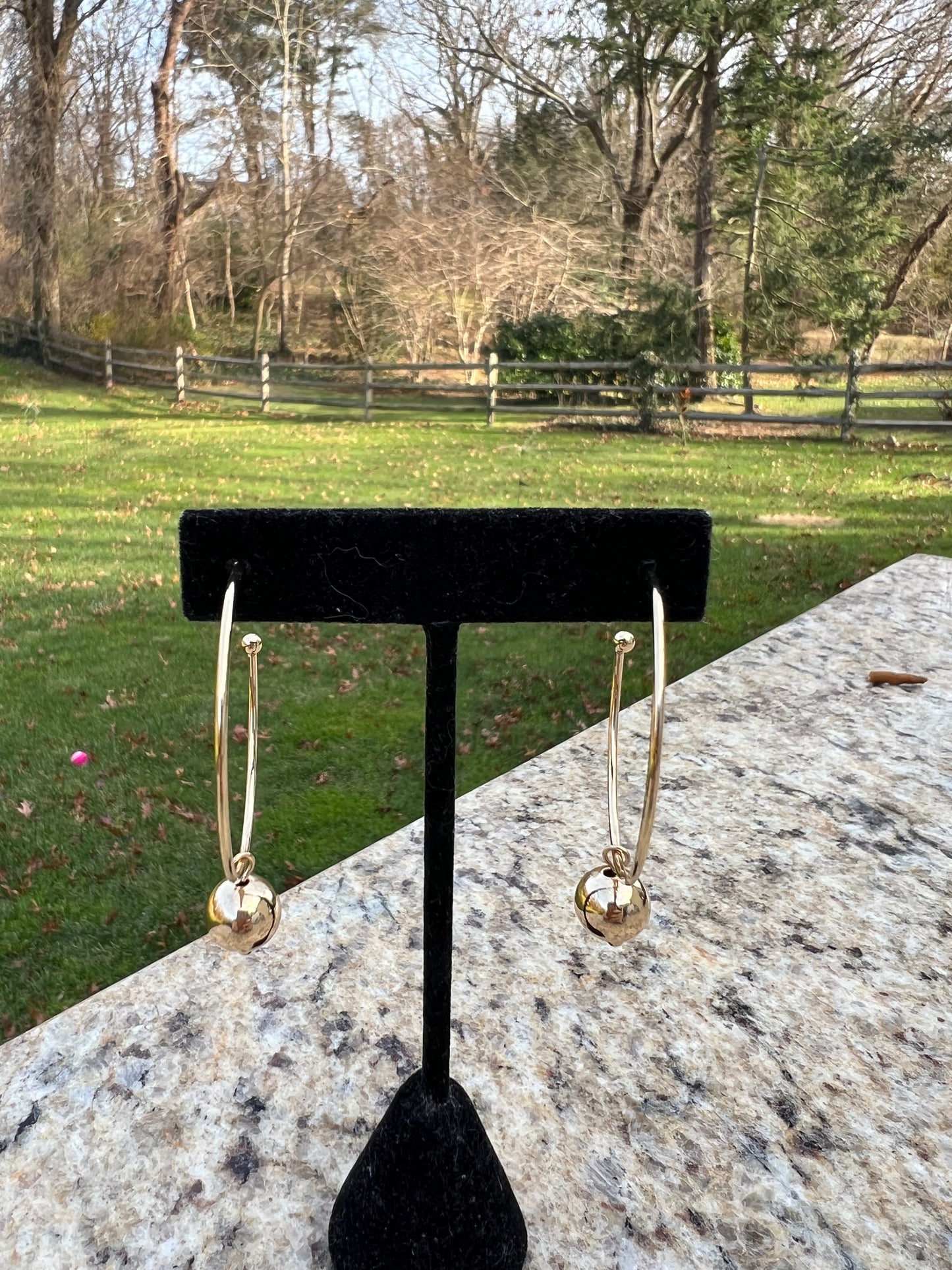 gold hoop with gold ball