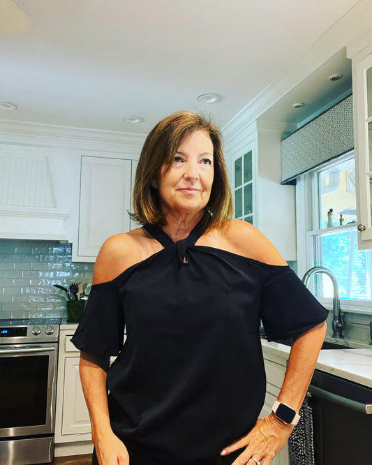 short sleeve off the shoulder top with button closure at neck
